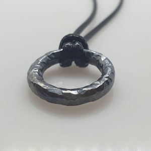 Karma circle hammered sterling silver pendant for man