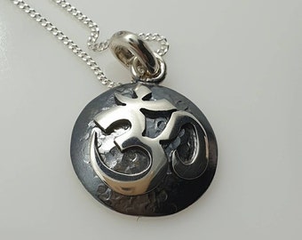OM sterling silver charm pendant