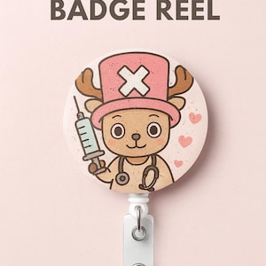 May include: A white ceramic mug with a black handle and the text "But First, Coffee" in a black, bold font. The mug is on a white surface. The mug is approximately 10 cm tall.