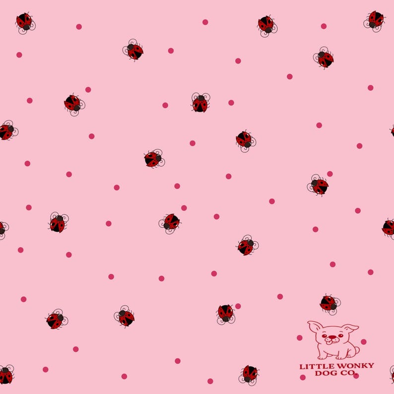 May include: Pink fabric with a repeating pattern of red ladybugs and small pink dots. The ladybugs have black details. The lower right corner features a cartoon dog and the text "LITTLE WONKY DOG CO."