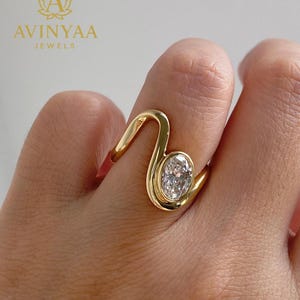 1 ct Oval Moissanite Wave Ring | Unique Curved Gold Band with Bezel Setting | Elegant Modern Statement Ring for Women