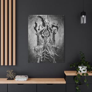 May include: Black and white artwork depicting a skeletal figure holding a sword aloft, surrounded by flames. The figure is seated on a throne, with a detailed, gothic style. The artwork is mounted on a canvas.