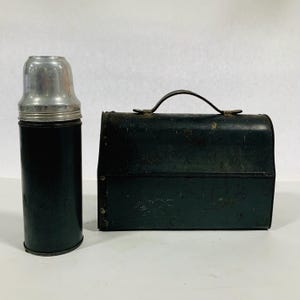 Lonchera de metal de 1913 de Universal L.F.&C.