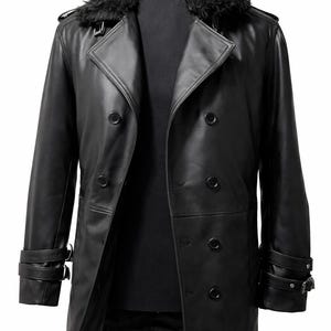 May include: A black leather trench coat with a faux fur collar. The double-breasted coat features multiple buttons, adjustable cuffs, and a classic design. The coat is displayed on a black mannequin.