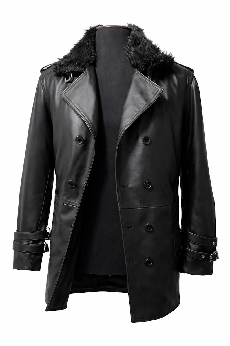 May include: A black leather trench coat with a faux fur collar. The double-breasted coat features multiple buttons, adjustable cuffs, and a classic design. The coat is displayed on a black mannequin.