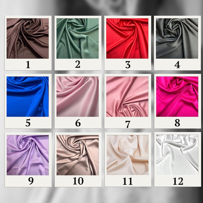 May include: A collection of twelve fabric swatches in various colors, including brown, green, red, gray, blue, pink, and purple. The fabric appears to be a smooth, satin-like material, with visible folds and textures.