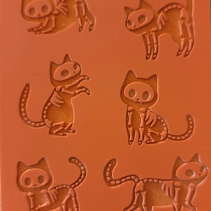Cabtopia | Skeleton Kittens | Texture Mat for Clay| Clay pattern stamps| Clay imprints| Polymer clay texture and PMC | TM513