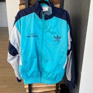 Vintage Adidas träningsjacka blågrön och marinblå – Dragkedja i retrostil från 90-talet