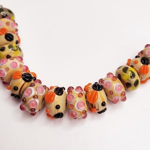 Lampwork Glass Beads: Tan with Pink, Orange & Black Designs (12mm, 15 Beads)