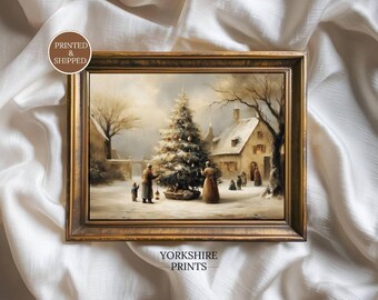 May include: A framed art print titled YORKSHIRE PRINTS featuring a snowy village scene with a large decorated Christmas tree, figures in period clothing, and a stone cottage. The frame is dark brown with a textured, ornate finish.