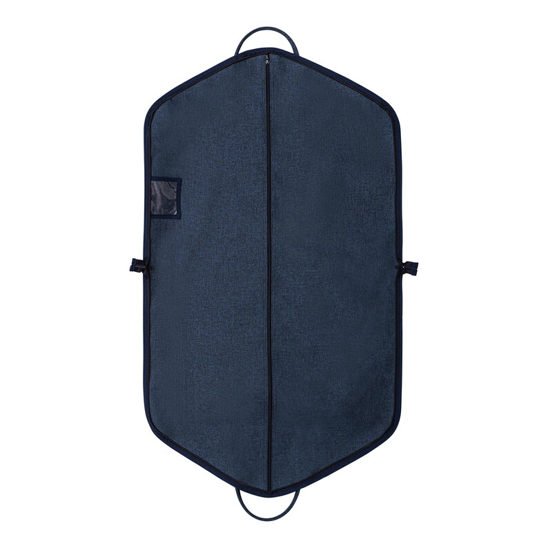 May include: A navy blue garment bag with a textured fabric. The bag has a full-length zipper, a small clear window, and a dark blue trim. It features a handle at the top and bottom for easy carrying. The bag is designed to protect clothing during travel.