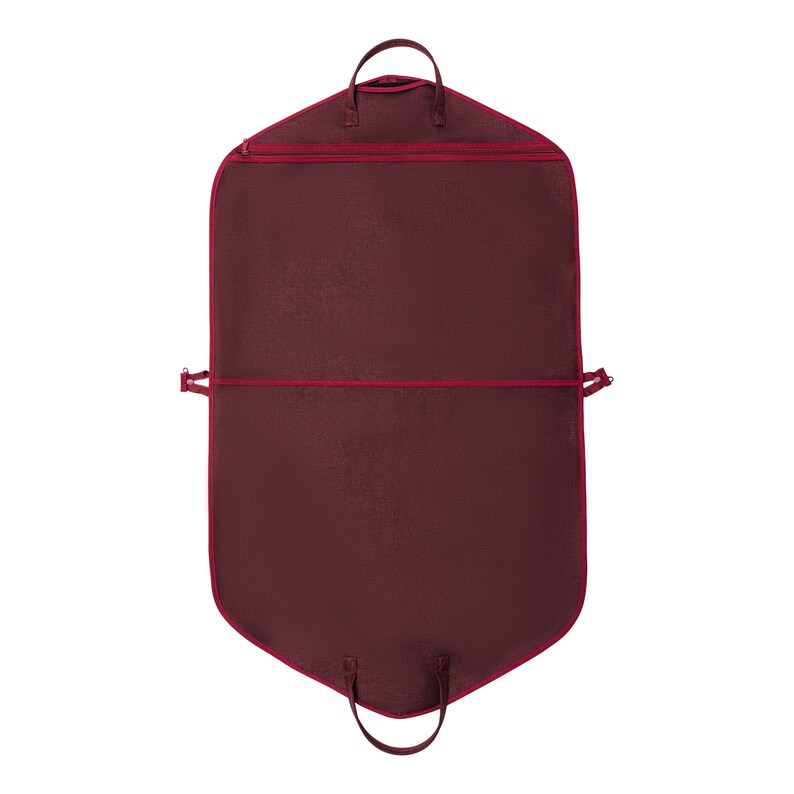 May include: A burgundy garment bag with a full-length zipper and two handles at the top and bottom. The bag has a red trim and a horizontal zipper across the middle. The bag is designed to protect clothing during travel.