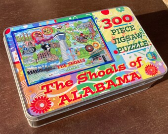 The Shoals of Alabama 300 piece jigsaw puzzle with metal collector tin/ signed by artist