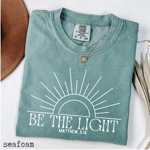 Comfort Colors® Be The Light Shirt, Matthew 5:14 Bible Verse Shirt,Inspirational Gift,Religious Clothing,Christian Celestial Shirt,Faith Tee