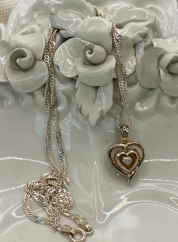 Caged Pearl in a Silver Heart on a 18 in Sterling 