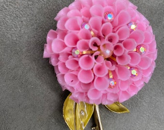 Pretty Pink Plastic Chrysanthemum with Rhinestone Accents set on a Lacquer stem and leaf