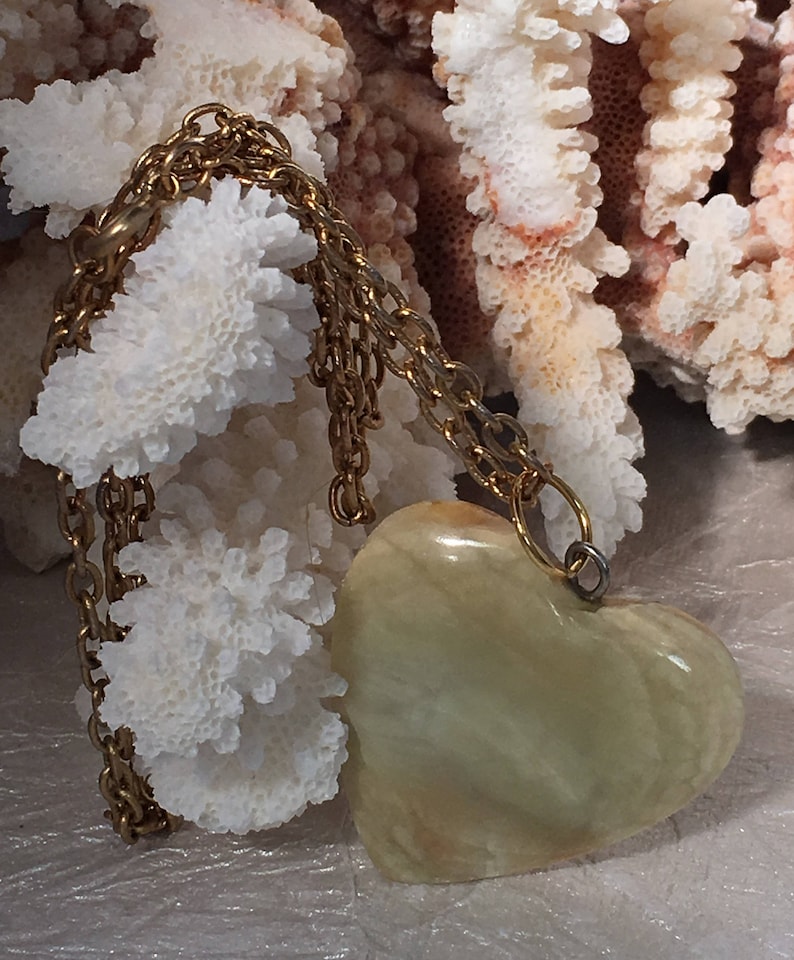 Wonderful Jasper Heart on a 24 inch gold tone necklace .