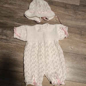 Beautiful Hand knitted baby romper set including hat and booties 0-3 months. FREE DELIVERY