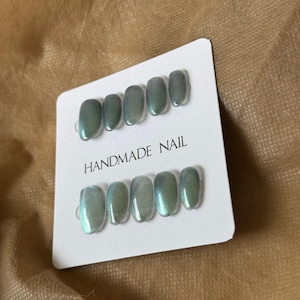 Elegant Cat Eye Green Press On Nails – Handmade Reusable Nail Set – Oval Short Length – Shimmery Metallic Look