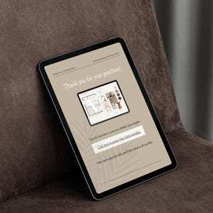 May include: A digital tablet displaying a webpage with the text "Thank you for your purchase!" and a graphic of a room design. The tablet is on a brown surface. The screen also includes a link to access the Canva template.