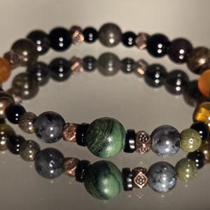 May include: A rustic wooden sign with the text "Welcome to our home" in white lettering. The sign features a distressed finish and a simple, inviting design, perfect for a front porch or entryway.