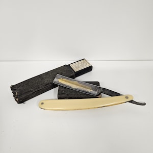 Henry Boker Etched Straight Razor with case.