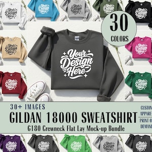 Könnte beinhalten: Ein Flatlay-Mockup-Bundle von Gildan 18000 Sweatshirts in verschiedenen Farben. Jedes Sweatshirt zeigt den Text "Your Design Here" in Weiß. Das Bild zeigt über 30 Farben, mit dem Text "30 COLORS" in einem Kreis.
