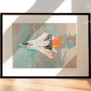 May include: A framed painting of a white fighter jet with orange and blue accents flying through the air. The background is a light blue and orange abstract design.
