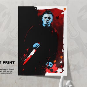 May include: A fine art print of a horror movie character with a knife. The character is wearing a black mask and has a blue face. The background is red with fall leaves.