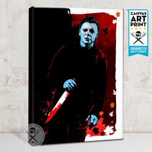 May include: A digital art print of Michael Myers, the iconic horror movie character, holding a knife. The background is a red and white splatter pattern with falling leaves. The text "CANVAS ART PRINT" is in the top right corner.