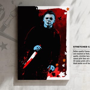 May include: A stretched canvas print featuring a digital illustration of Michael Myers from the Halloween franchise. The image is in a pop art style with a red background and a black silhouette of Michael Myers holding a knife. The text "STRETCHED CANVAS PRINT" is in the bottom right corner of the image.