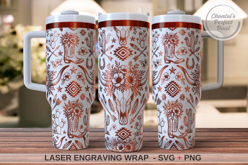 May include: Three white tumblers with handles featuring a copper-colored laser engraving wrap design of cowboy boots, cacti, flowers, arrows, stars, horseshoes, and a steer skull. The text at the bottom reads LASER ENGRAVING WRAP - SVG + PNG.