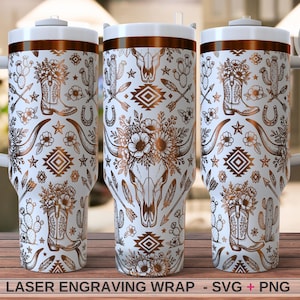 May include: A white tumbler with a copper-colored laser-engraved pattern featuring cowboy boots, cacti, flowers, arrows, horseshoes, and a steer skull. The design includes geometric shapes and stars. The tumbler has a white handle and lid.