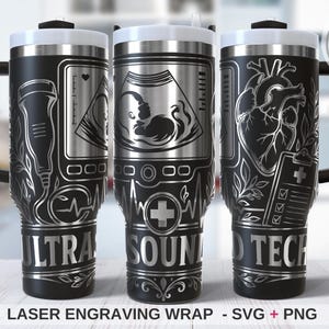 May include: Black and silver travel mug with laser-engraved medical-themed designs. The mug features images of ultrasound equipment, a fetus, and a human heart. The text "ULTRA SOUND TECH" is displayed on the mug.