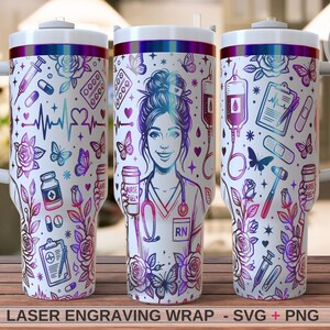 May include: White tumbler with a wraparound design featuring a nurse illustration, medical symbols, butterflies, and roses in purple, blue, and pink hues. The tumbler has a white handle and lid with a colourful iridescent band. Text at the bottom reads "LASER ENGRAVING WRAP - SVG + PNG".