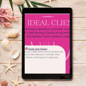May include: A black tablet displays a pink and white graphic with the text "IDEAL CLIENT." The tablet is surrounded by seashells and starfish on a light wood surface. The graphic includes the words "Goals and Values."