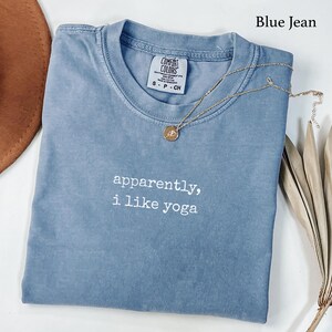 Blue Jean Comfort Colors t-shirt with "apparently, i like yoga" text.