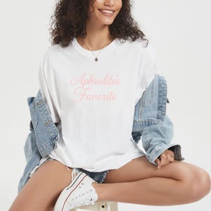 Aphrodite&#39;s Favorite Tshirt, Greek Mythology Tee, Vintage Style Shirt, Unisex Graphic Top, Mythical Goddess Apparel