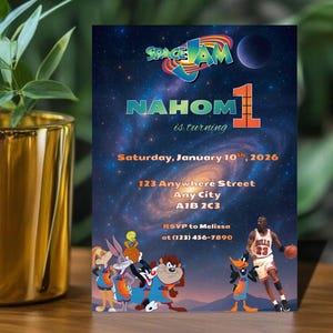 May include: A birthday invitation featuring the Space Jam logo and characters. The invitation includes the name "NAHOM", the date "January 10, 2026", and an address. The design has a space theme with a basketball player.
