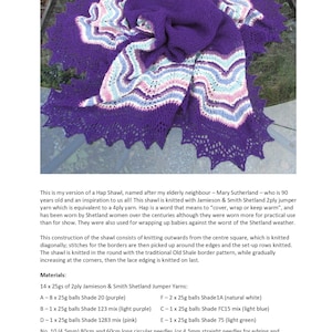 May include: A purple, light purple, pink, light blue, and white knitted shawl with a lace edging. The shawl is approximately 50 inches square.