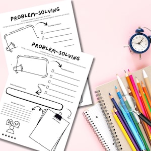 May include: Two white problem-solving worksheets with black text and illustrations are on a pink surface. A blue alarm clock, a notebook, a magnifying glass, and several coloured pencils are also visible. The worksheets have sections for identifying problems and finding solutions.