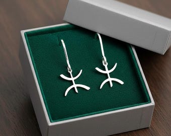 Boucles d'oreilles YAZ tifinagh – Adaptation moderne d’un bijou amazigh– boucles d'oreilles berbères- ethniques- bijoux amazigh.