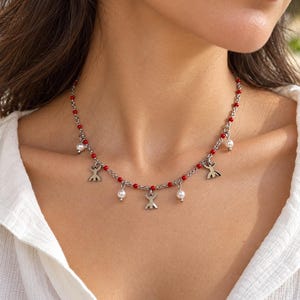 Berberiskt Amazigh-halsband för kvinnor - med naturliga snäckpärlor - med Amazigh-symbolen ⵣ - Berberhalsband - Kabyliskt halsband