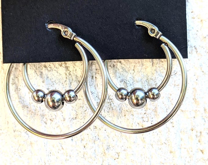 Boucles d'oreilles acier inoxydable - créoles intemporelles.