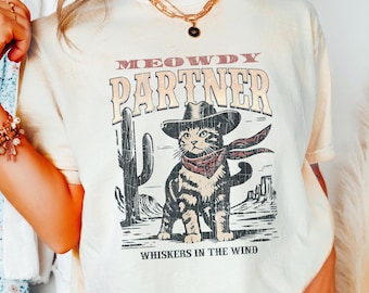 Meowdyパートナーカウボーイキャットシャツ、レトロカウボーイシャツ、面白いカウボーイキャットシャツ、ハウディカウガールTシャツ、ウエスタンキャットシャツ、猫好きへのギフト
