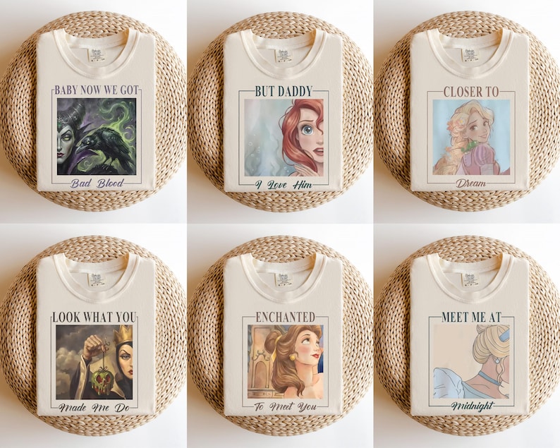 May include: A collection of six off-white t-shirts, each featuring a rectangular graphic print of a different animated character. The prints include text such as BABY NOW WE GOT BAD BLOOD, BUT DADDY I LOVE HIM, CLOSER TO DREAM, LOOK WHAT YOU MADE ME DO, ENCHANTED TO MEET YOU, and MEET ME AT MIDNIGHT.