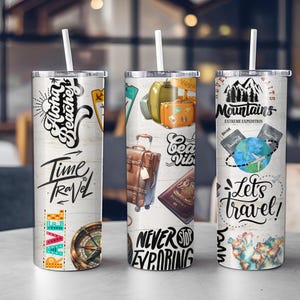 May include: Three travel-themed tumblers with white lids and straws. The designs include travel phrases, luggage, a compass, and a world map. The text on the tumblers includes "Aloha Beaches", "Time to Travel", "Never Stop Exploring", and "Let's Travel!"
