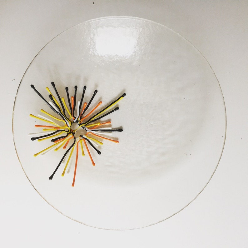 Handmade glass serving bowls with fireworks like textured glass details