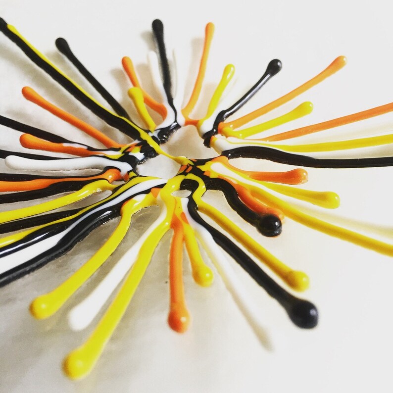 Handmade glass serving bowls with fireworks like textured glass details