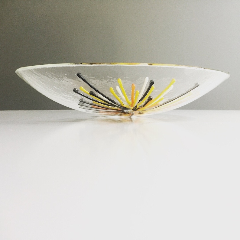 Handmade glass serving bowls with fireworks like textured glass details